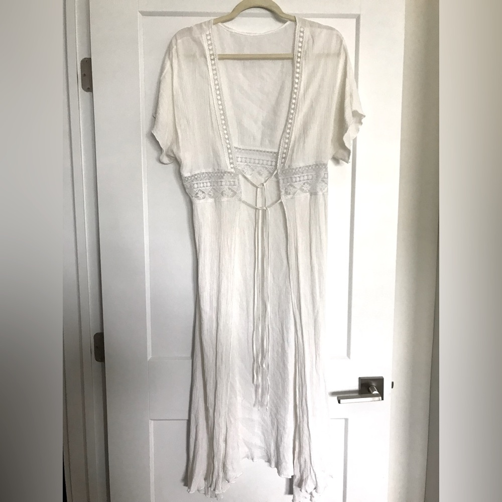 White, long cover-up or jacket